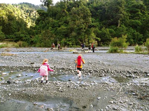 O---Access -to -some -of -the -huts -in -the -Orongorongo -Valley -require -crossing -wide -riverbeds